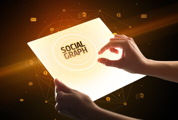 holding futuristic tablet, social media concept