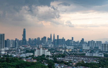 City view of Kuala Lumpur with dark sky at sunset time