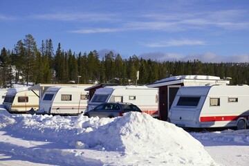 Snowy Winter camping with trailer in Storhogna, Sweden.