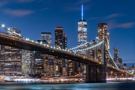Brooklyn Bridge and Lower Manhattan skyline at night, New York City, USA