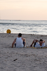 relaxing at the beach near sunset