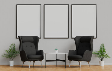 Mockup of three framed posters on a wall in a living room