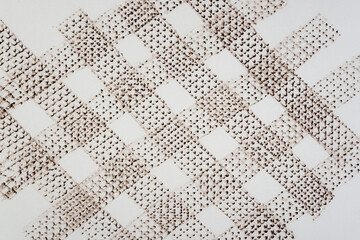 frottage technique featuring a grid or net pattern on tracing paper and photographed on a white...