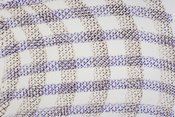 frottage technique featuring a grid or net pattern on tracing paper and photographed on a white...