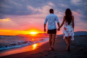 Sunset Stroll: A Couple's Romantic Walk on the Beach