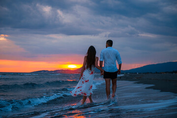 Sunset Stroll: A Couple's Romantic Walk on the Beach