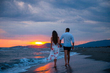 Sunset Stroll: A Couple's Romantic Walk on the Beach