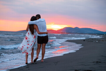 Sunset Stroll: A Couple's Romantic Walk on the Beach