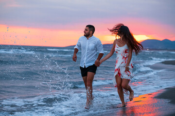 Sunset Stroll: A Couple's Romantic Walk on the Beach