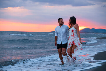 Sunset Stroll: A Couple's Romantic Walk on the Beach