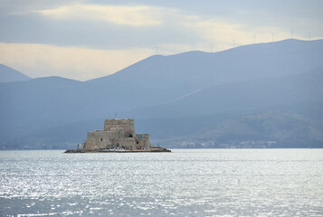 The town of Nafplio in the eastern Peloponnese (Greece). Bourtzi, Venetian water fortress at the entrance of the harbour.