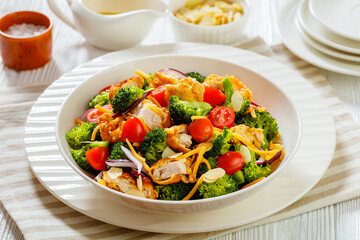 fried chicken tenders broccoli salad in bowl
