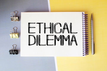 clipboard with white blank paper text ethical dilemma , calculator and chart, business concept.