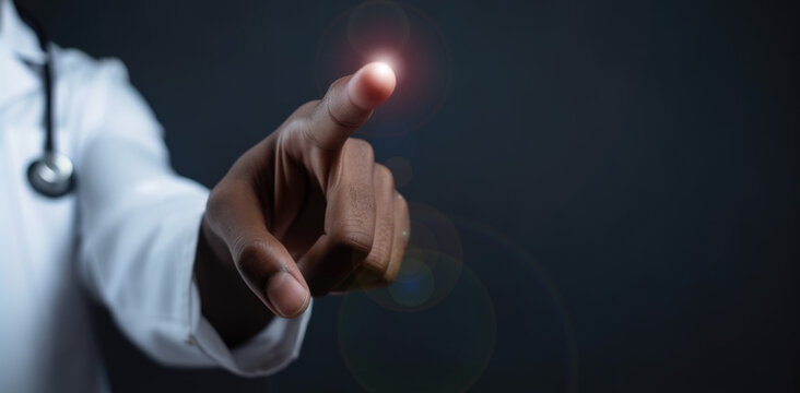 A Closeup Photo Of A Black Doctor Hand Pointing Forward. African American Doctor Pointing Forward. Reaching, Touching Invisible Touch Screen Display. Pointing Toward Camera Lens. Pointing At Camera.