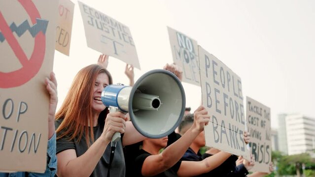 People protest at demonstration for financial crisis on the streets - Crowd fight against global economy