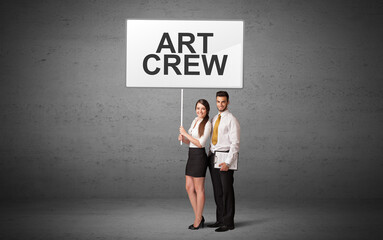 Fototapeta premium business person holding a traffic sign