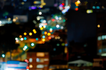 Fototapeta na wymiar Defocused night panorama of the streets of Bogota, Colombia