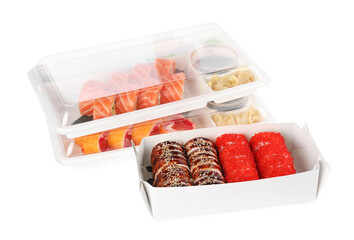 Food delivery. Containers with different delicious sushi rolls on white background