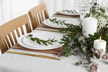 Stylish elegant table setting for festive dinner indoors