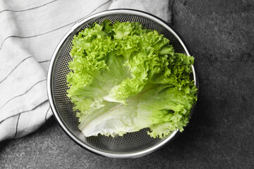 Fresh lettuce on stone table, top view