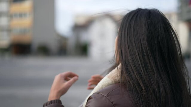 One annoyed young woman portrait face closeup with upset expression. Person not wanting to be bothered emotion