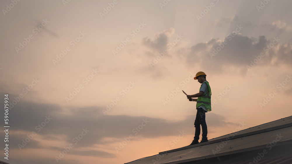 Wall mural service engineer checking solar cell on the roof for maintenance if there is a damaged part. enginee