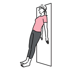 肩甲骨ストレッチをしているトレーニングウェアを着た若い女性
