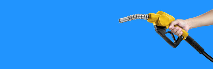 Hands holding Fuel nozzle on blue background