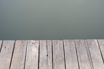 wooden floor and green wall