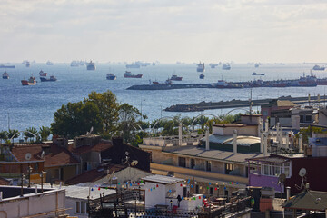 Top view of the city and harbor with sea vessels