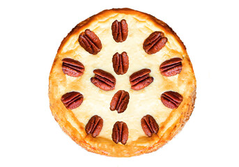 Homemade pecan pie decorated with nuts isolated on white background