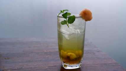 lychee tea drink in a glass cup