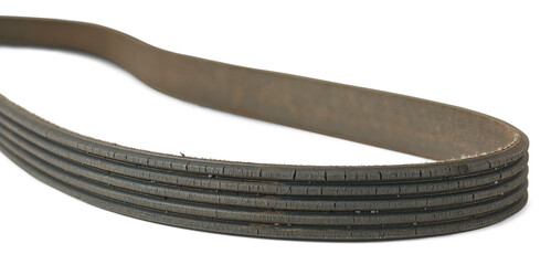 old used and worn out vehicle drive belt isolated, failed and cracked serpentine belt taken in...