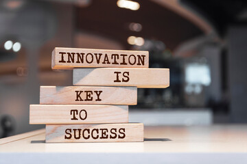 Wooden blocks with words 'Innovation is key to success'. Business concept