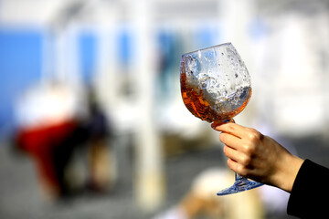 a glass of port wine in hand, portugal drink alcohol