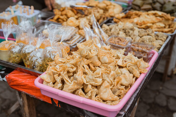 mix of traditional cuisine from street food vendor. deep fried banana