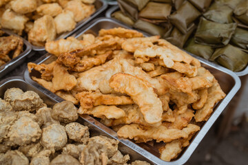 mix of traditional cuisine from street food vendor. deep fried banana