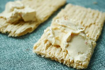 cheese cream spread crackers on table 