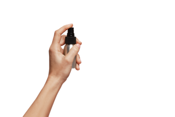 Hand holding spray bottle.