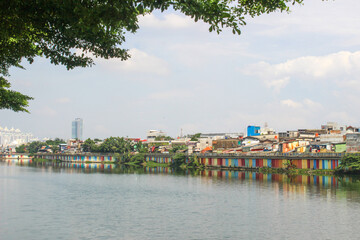Densely populated houses on the edge of Lake Sunter or danau sunter.