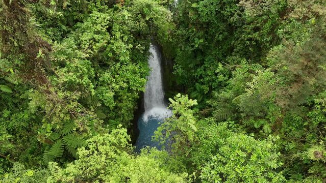 Beautiful Hidden Waterfall In The Jungle With Blue Pool (Aerial 4K Drone Video)