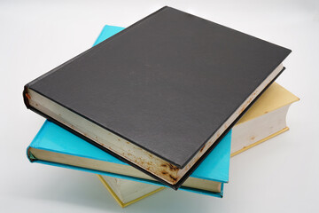 black thick book blue and chicken