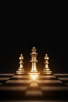 King chess pieces stand win with teamwork concept of team player or business team and leadership strategy or strategic planning and human resources organization risk management.