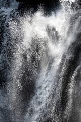 Waterfall with water drops and sprays.