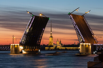 Russia. Open Palace Bridge and view of the Peter and Paul Fortress in St.Petersburg in white night