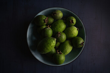 fresh feijoas fruit in a bowl