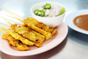 Pork Satay with your Peanut Sauce. It is a dish made from thinly sliced meat. or cut into cubes It may be pork, chicken, beef, lamb, goat meat, fish, etc., plugged with a skewer made of bamboo. Then g