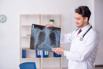 Young male doctor radiologist working in the clinic