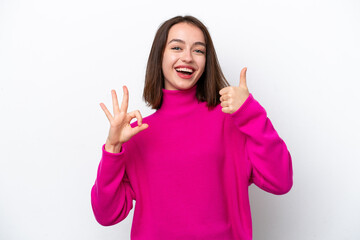 Young Ukrainian woman isolated on white background showing ok sign and thumb up gesture