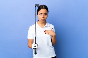Young golfer woman over isolated colorful background pointing to oneself